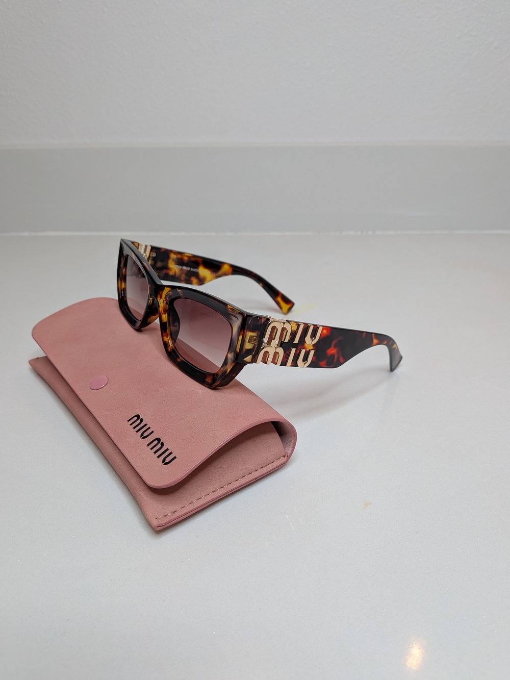 Miu Miu Tortoise Cat Eye Sunglasses Gold Logo
